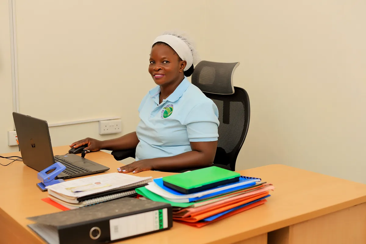 Roki administrative staff at the buyer-correspondence desk, Najjanankumbi office